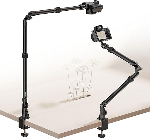 Ulanzi ZJ02 desk mount camera bracket with C-clamp attached to a desk edge, showing the 4-section folding arm extended upwards with its 360-degree ball head.