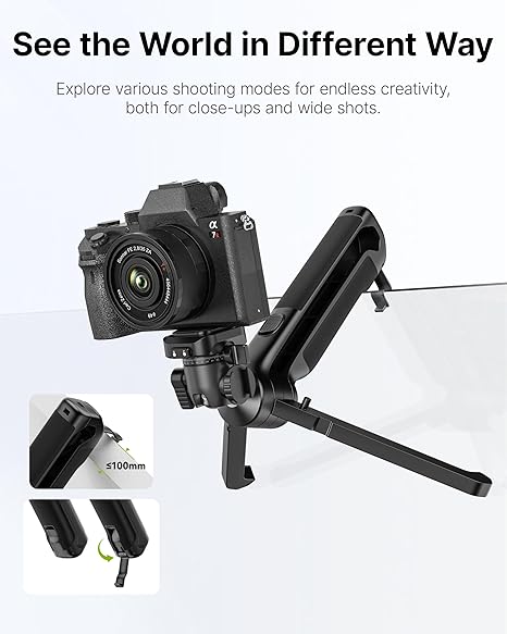 The TT38 tripod fully extended with a mirrorless camera mounted, set against a scenic outdoor background