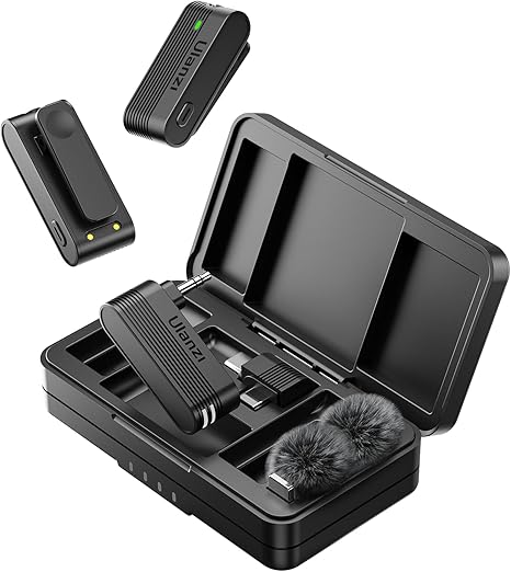 Close up view of the miniature Ulanzi A100 Wireless Microphone attached neatly to a shirt collar using the magnetic mount disk.