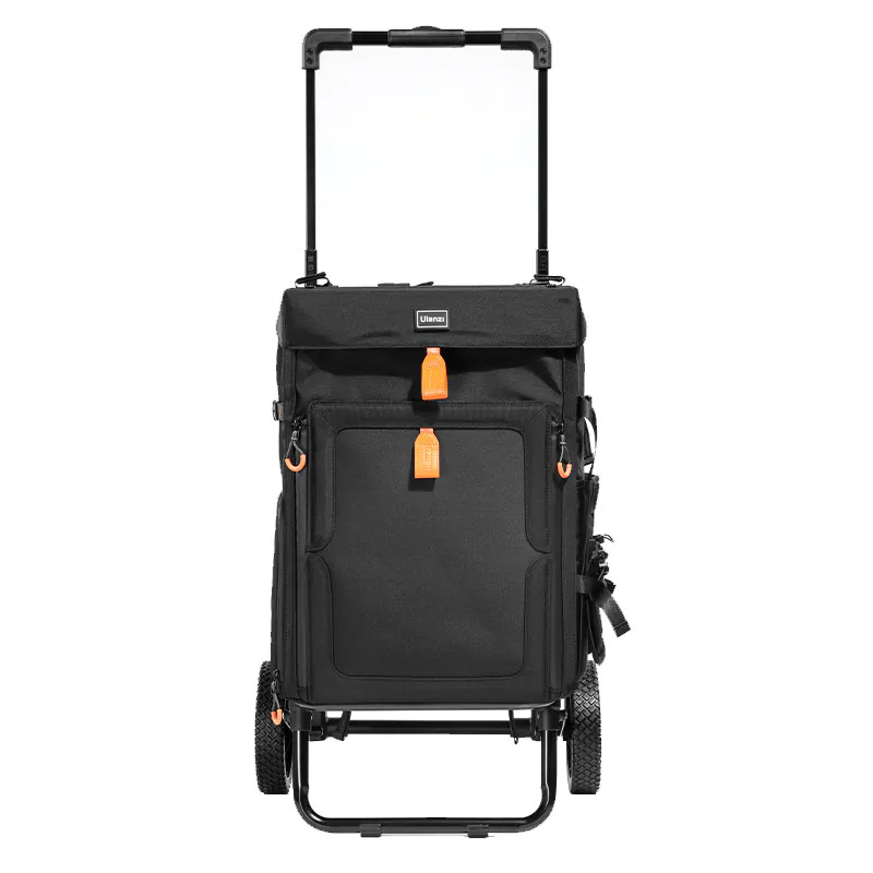 Matte black Ulanzi BT03 Photography Cart standing upright on its rolling wheels with the pull rod fully extended.